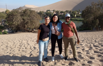 Carolina Amparo (right) with friends at the Ica Desert in Peru. 